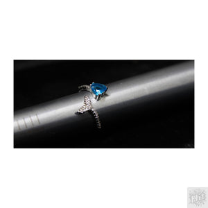 Elegant Silver Jewelry with Blue Gemstone and Sparkling Accents 1
